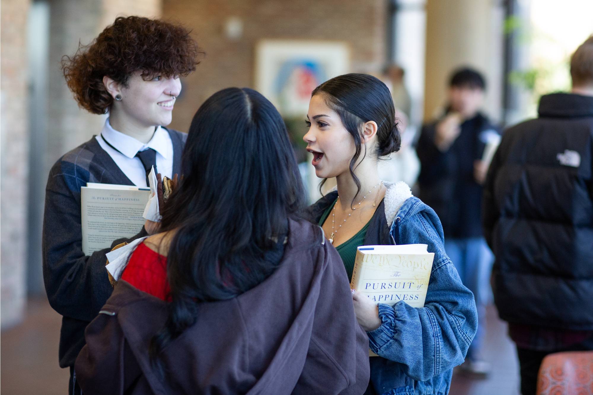 students speaking after event
